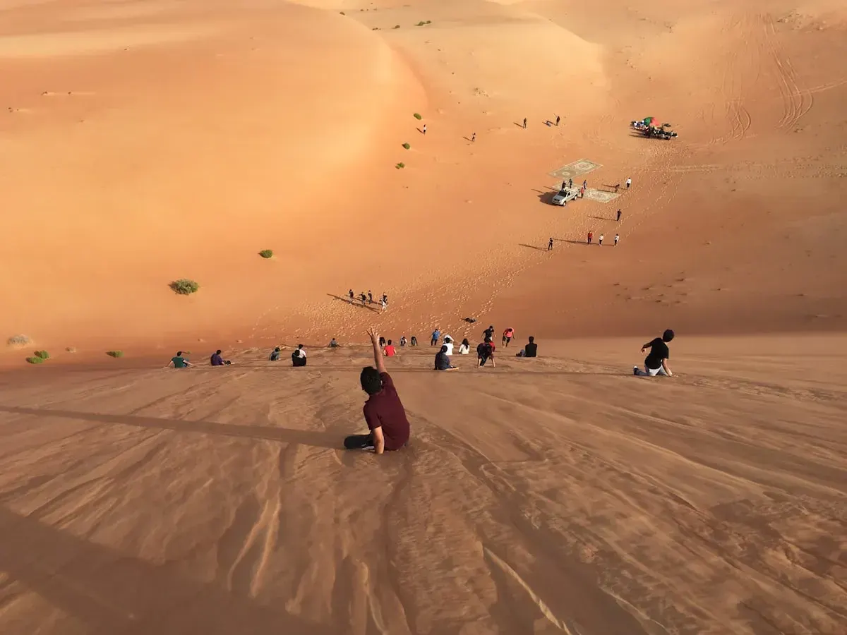 Guests comparing private Abu Dhabi desert safari options